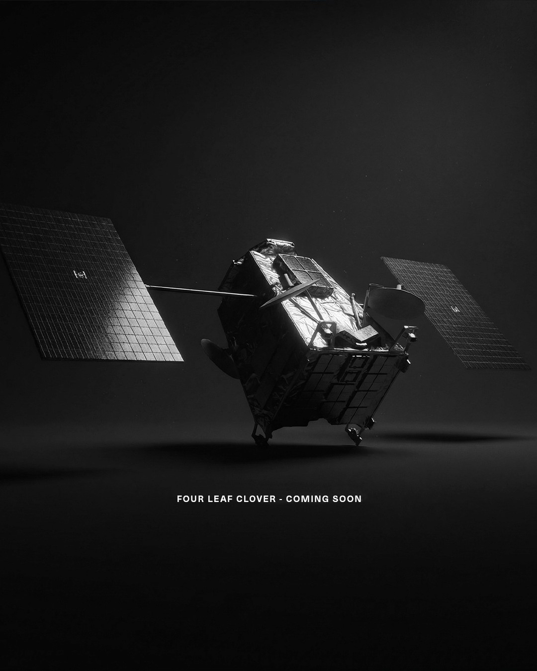 The Four Leaf Clover satellite, a dark studio shot of the flagship payload.